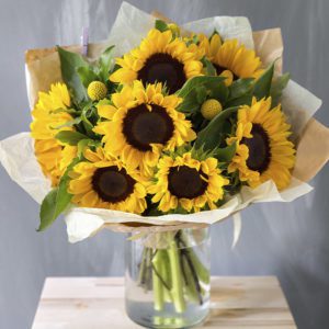 Sunflowers in Vase - Sending Flowers in Delhi | Order Now at June Flowers